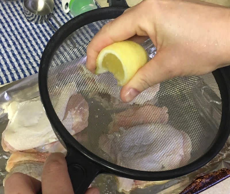 Use a strainer to filter out any seeds and squeeze the lemon wedges over the chicken (one total lemon per each chicken thigh). Throw away the squeezed lemon wedges.