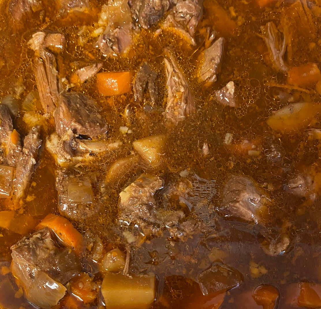 Combine all ingredients in a crockpot and cook on low setting for 20 hours. After the first hour, regularly press the ingredients beneath the broth line with a wooden spoon. Do not worry if the broth is not above the contents initially. Add spring water or broth later if necessary.
