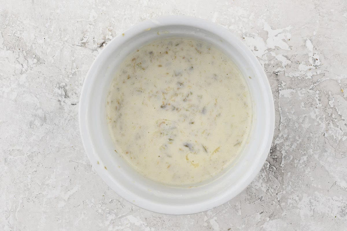 Mince capers. In a microwave-safe bowl, combine capers, crème fraîche, and lemon juice. Cover with a damp paper towel. Microwave covered until crème fraîche melts, 30-60 seconds. Remove from microwave and add remaining butter. Stir until combined and smooth.
