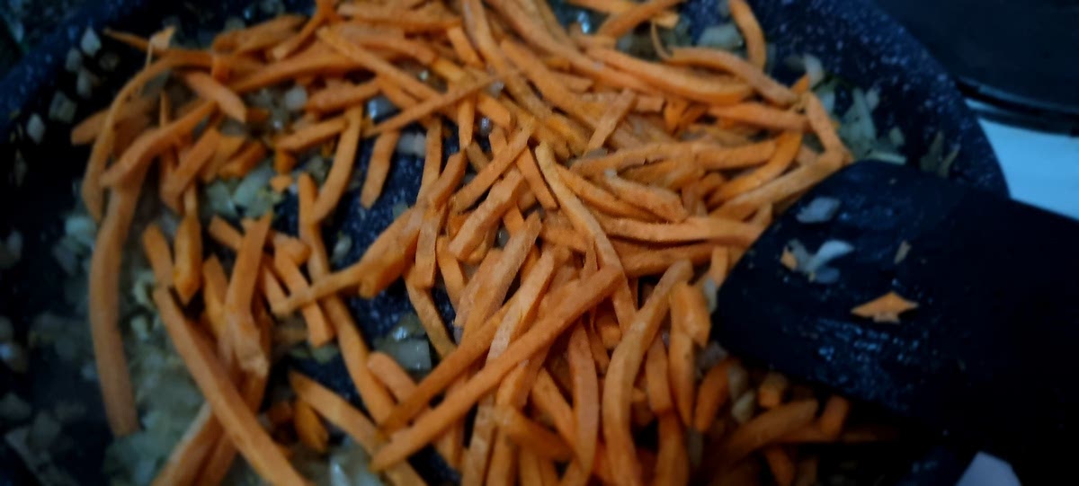 Next, in go the carrots. Continuing cooking over medium heat for a few minutes, stirring often.