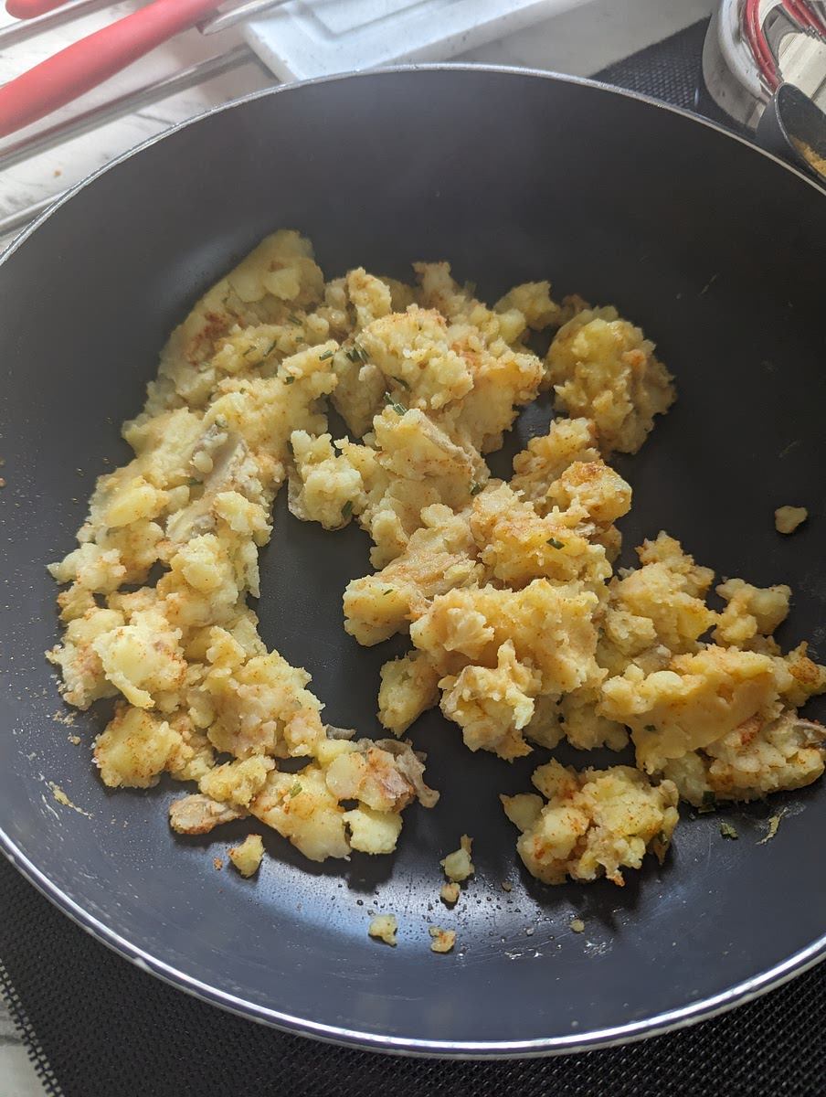 Add butter and fry the mashed potato until crispy