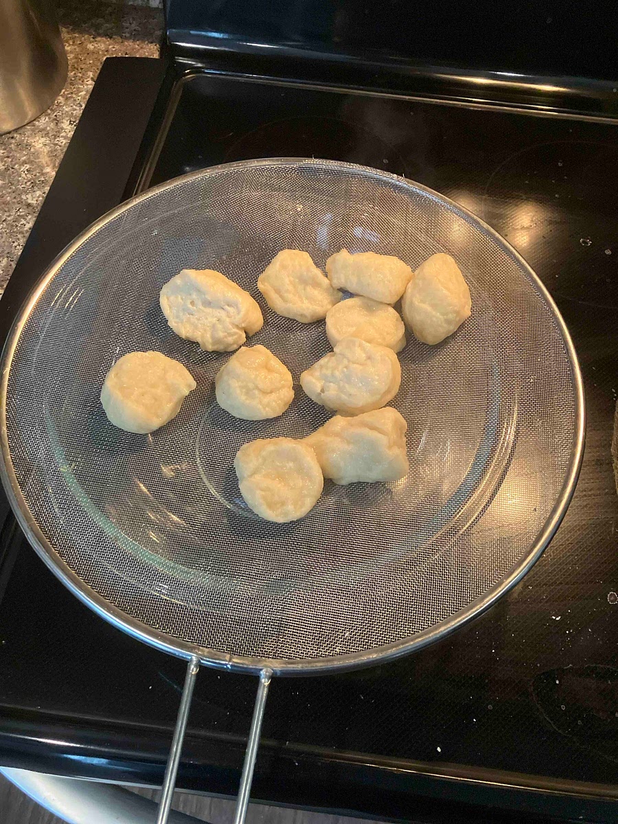 Remove from baking soda bath and place on flat mesh strainer over bowl for 30 seconds to strain the remaining water off
