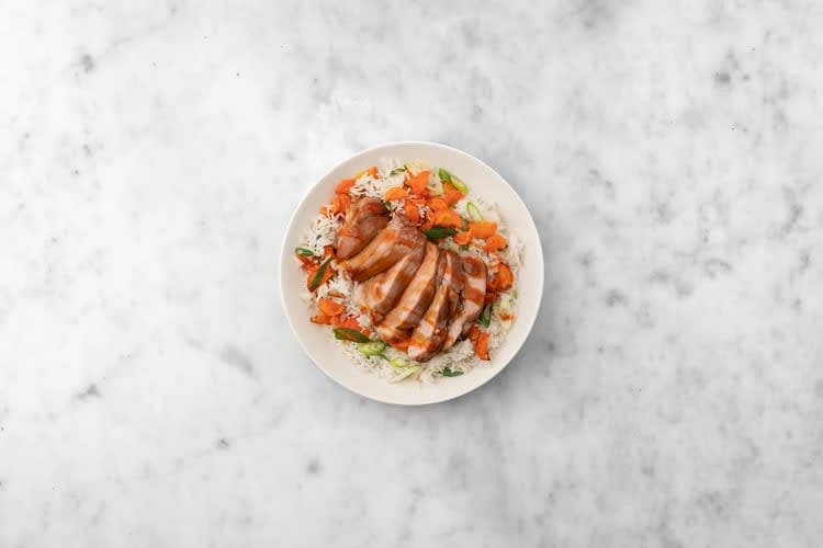 When pork is done, transfer to a cutting board and let rest for 3-5 min. Thinly slice pork, divide between plates, and top with sauce.