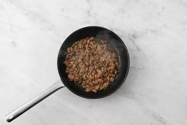 Add 1/2 tbsp oil, then beef and pork mix. Cook, breaking up meat into smaller pieces, until no pink remains (4-5 min, 165 °F internal temp). Season with salt and pepper.