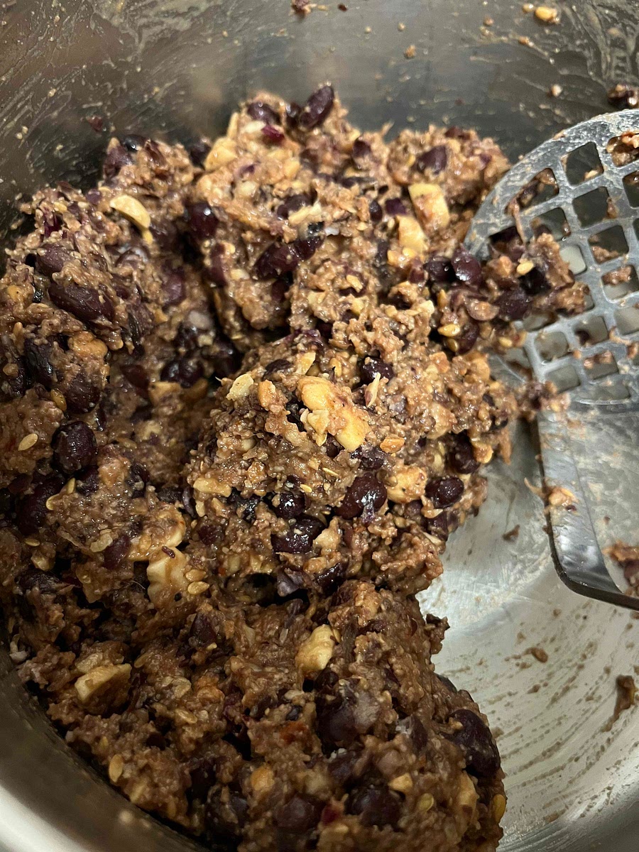 Crack and beat 1 egg and add to the bean mix, and combine fully. If the mixture is too wet you can add more breadcrumbs. If still dry, and more egg.