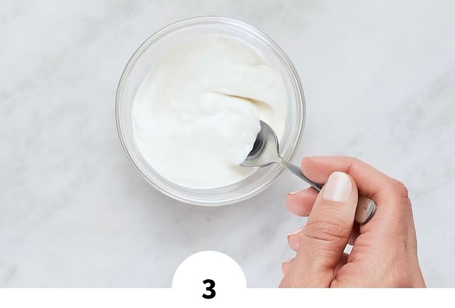 • In a small bowl, combine sour cream, mayonnaise, garlic powder, and a squeeze of lemon. Add water 1 tsp at a time until mixture reaches a drizzling consistency. Season with salt and pepper.