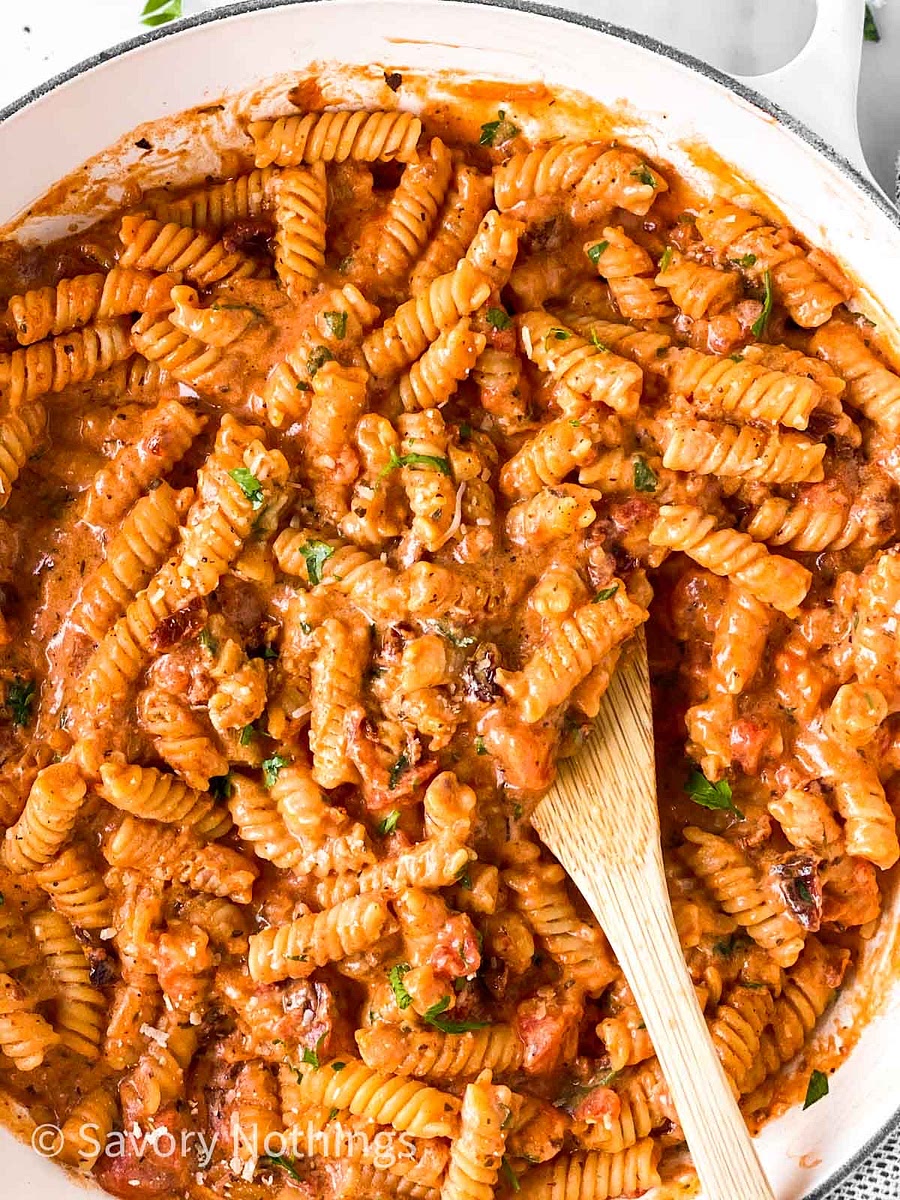 Add mozzarella and parmesan with some fresh basil. mix, then add the psta and some pasta water. let it cook for a few minutes, then serve it with som parmesan on top. enjoy:)