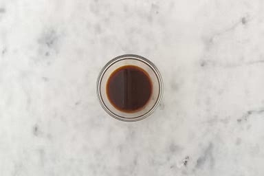 Meanwhile, add remaining cornstarch, maple syrup, soy sauce, oyster sauce, garlic salt and 1/2 cup water to another medium bowl. Season with pepper, then stir to combine.