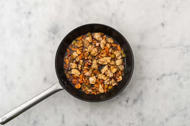 Reheat the same pan over medium-high. When hot, add 1 tbsp oil, then chicken. Cook until golden-brown, 2-3 min per side. Add veggies and sauce to the pan. Bring sauce to a boil. Once boiling, reduce heat to medium-low. Cook, stirring occasionally, until sauce thickens slightly and chicken is cooked through (6-8 min, 165 °F internal temp).