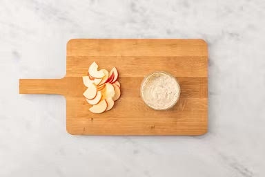 Meanwhile, core, then cut apple into 1/4-inch slices. Add Dijon, whole grain mustard, mayo and honey to a small bowl. Season with salt and pepper, to taste, then stir to combine.
