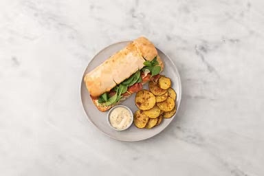 Spread some honey-mustard mayo on bottom buns, then stack with bacon, apples and spinach. Close with top buns. Halve melts, if desired. Divide melts between plates. Serve remaining honey-mustard mayo alongside for dipping.