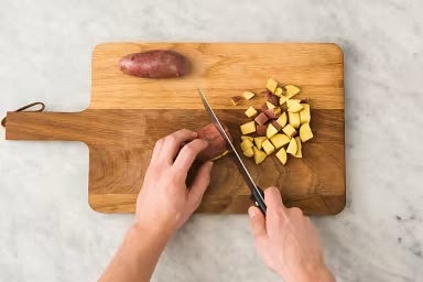 Meanwhile, cut potatoes into 1/2-inch pieces. Add potatoes and 1 tbsp oil to a parchment-lined baking sheet. Season with pepper and 1 tsp seasoned salt, then toss to coat. Roast in the middle of the oven, flipping halfway through, until tender and golden-brown, 22-25 min.