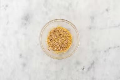 Return the same pan to medium-high. When hot, add 1 1/2 tbsp reserved bacon fat, then shallots. Cook, stirring often, until fragrant, 30 sec. Carefully transfer bacon fat and shallots to the large bowl with vinaigrette base. Sprinkle with some seasoned salt and pepper, to taste, then whisk to combine.