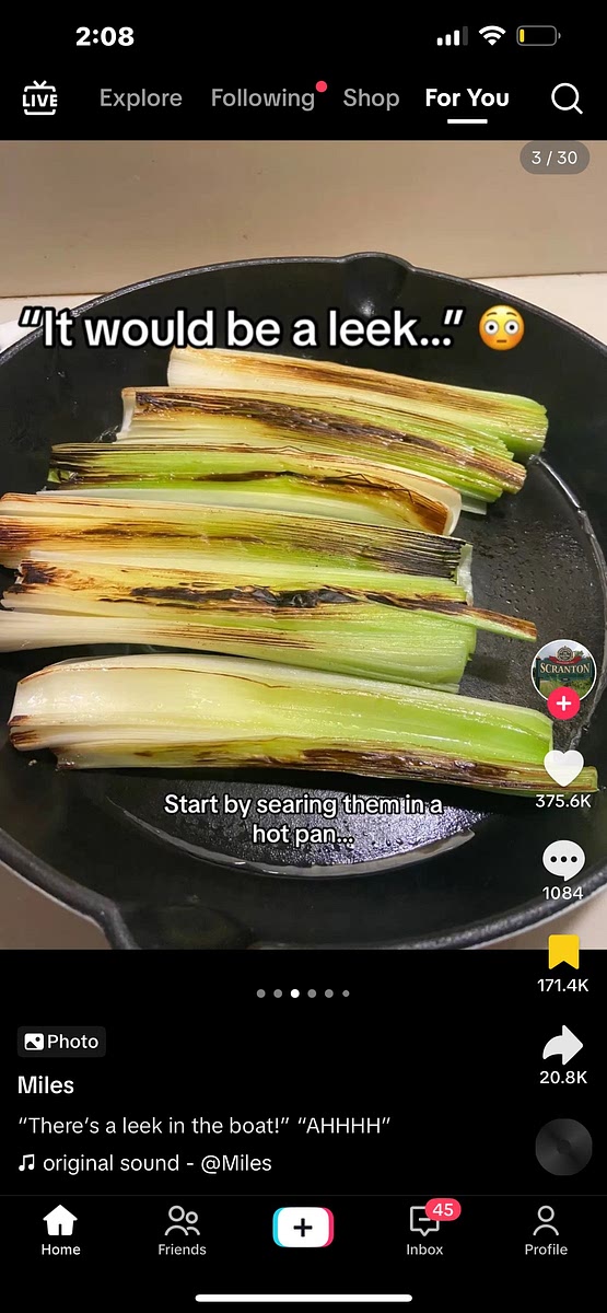Sear the bottom halves of the leeks in I cast iron