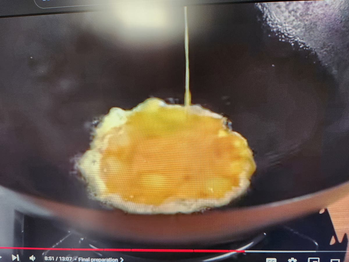 Add in beaten eggs to cooking oil. They should puff up around the edges. Stir after 15 secs and lightly scramble the eggs.