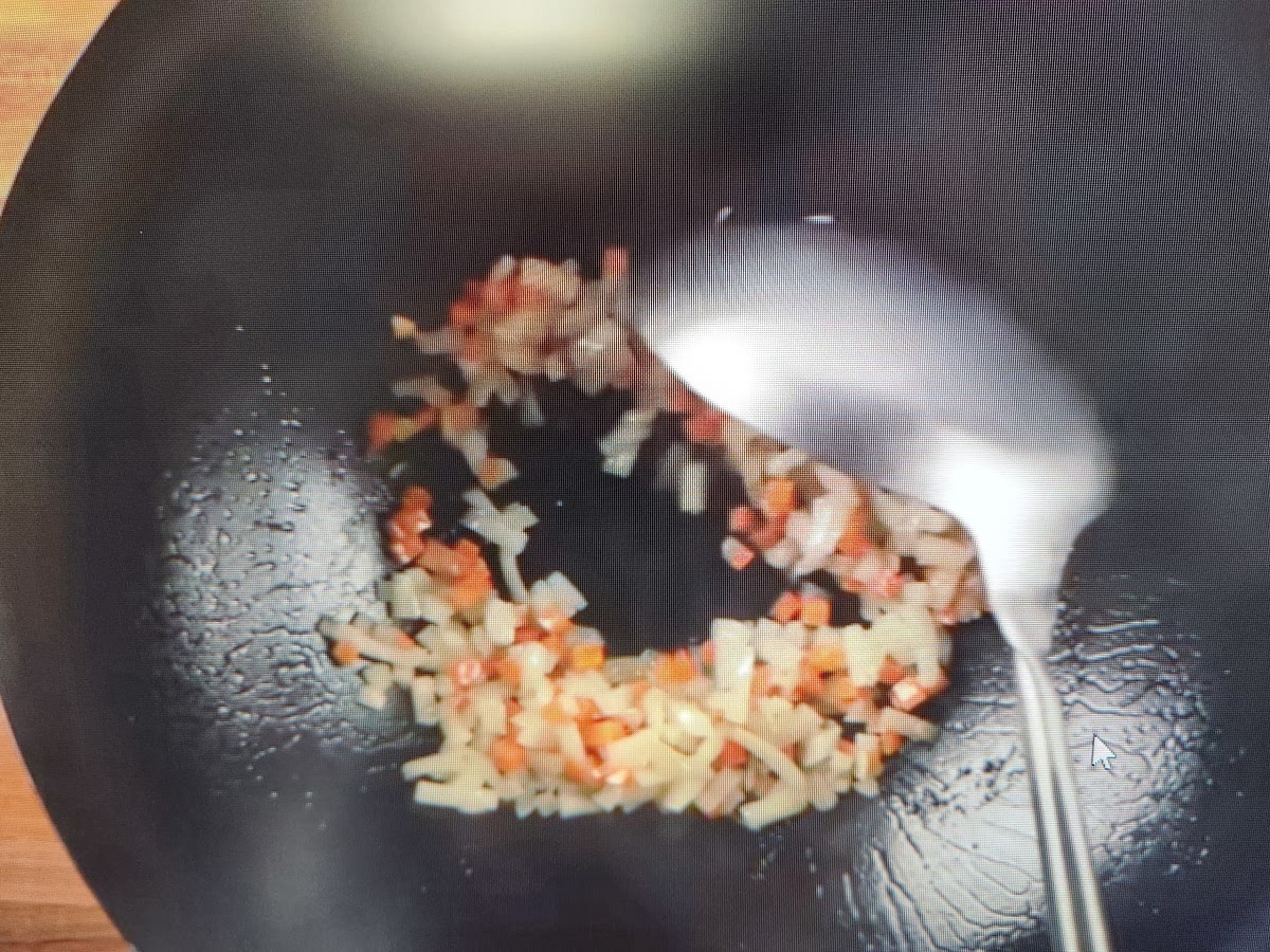 Add diced onions and diced carrots. Cook until onion is translucent.
