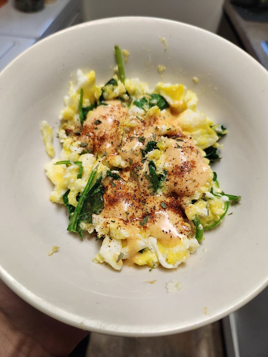 With the good stuff done being cooked, put your now cooked rice and toppings in a bowl together. Add siracha mayo, and flavor to taste.