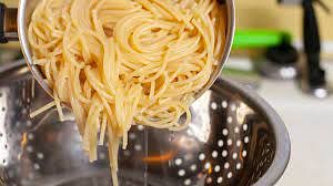 When the pasta is ready, drain the water and add the pasta to the pan and stir