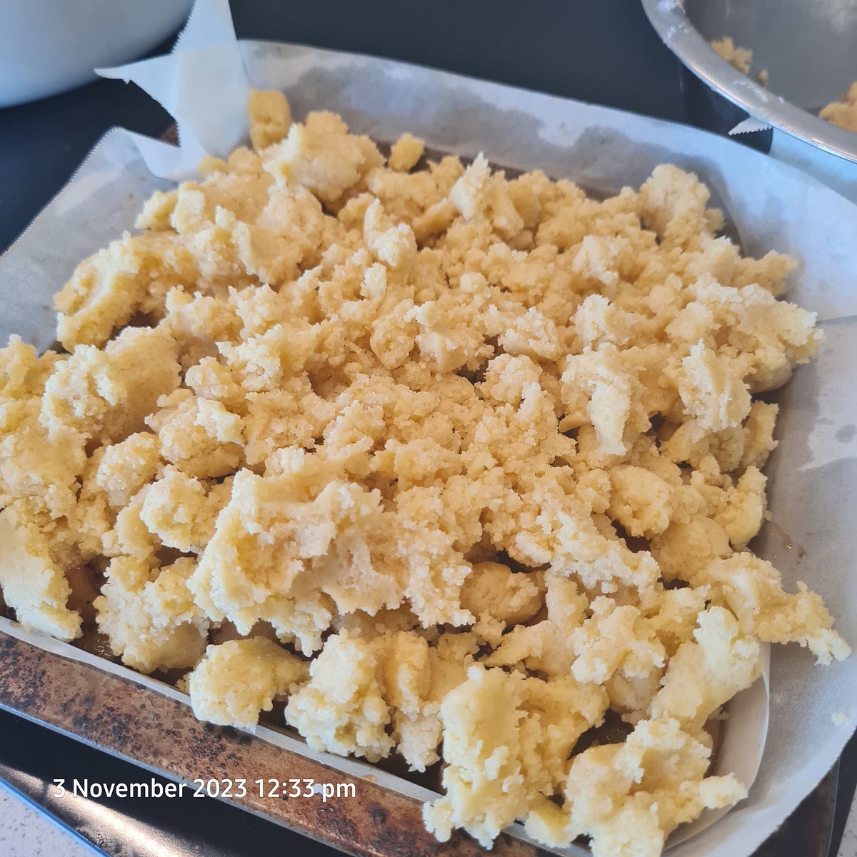 Spoon filling over base, sprinkle with remaining Crumble mixture