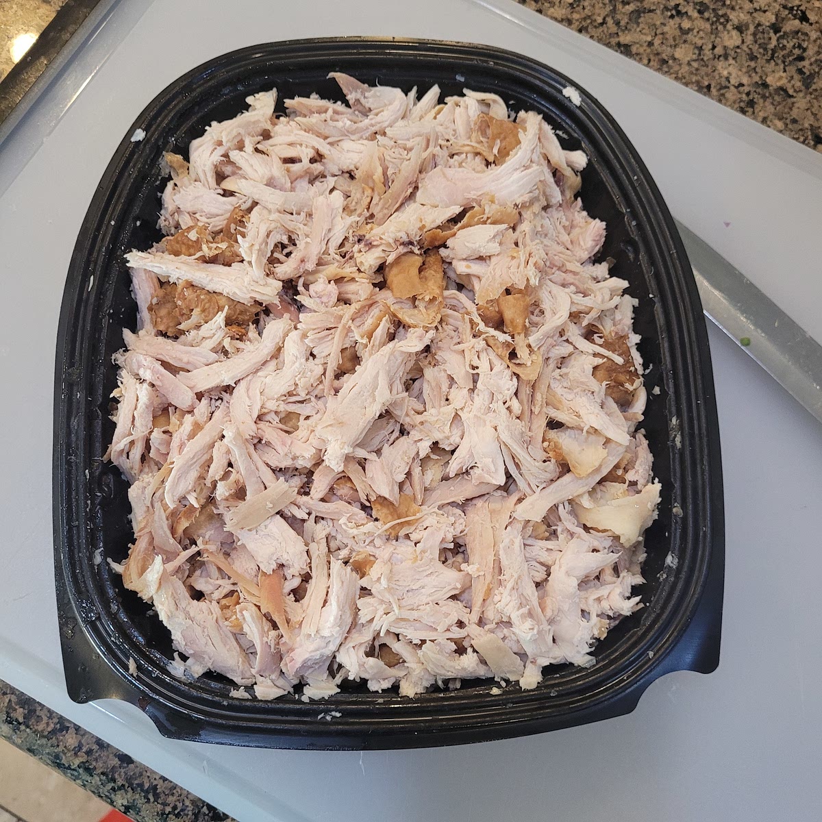 If you use a rotissary chicken, pull meat off the bone and shred.