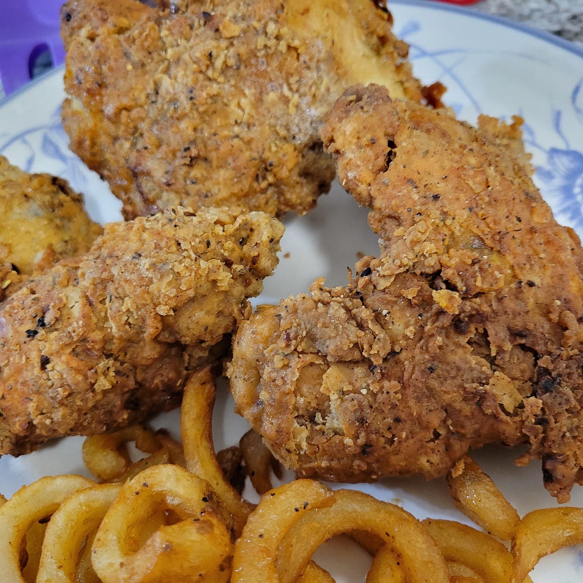 Fry chicken at 320° while avoiding overcrowding to ensure consistency for about 5 minutes. Carefully remove the chicken, turn up the heat to 350°, and fry the chicken again for 5-7 minutes or until internal temperature reaches at least 165°
