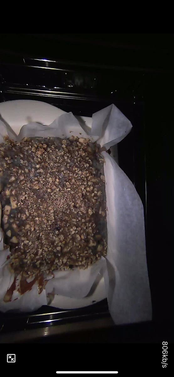 Optionally, dust the top of the cake with powdered sugar after it has cooled.