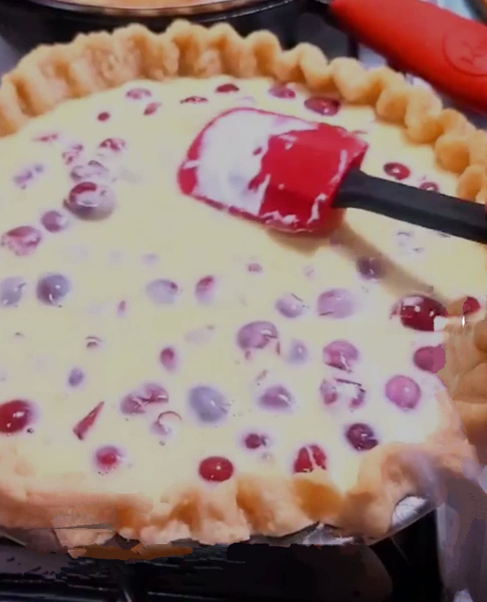 Mix all ingredients until well incorporated, pour over cherries, and bake for 35 minutes.