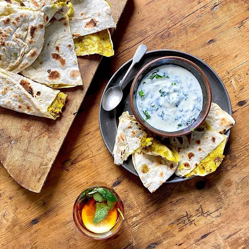 Serve warm, cut into fat wedges, alongside a complimentary dip.