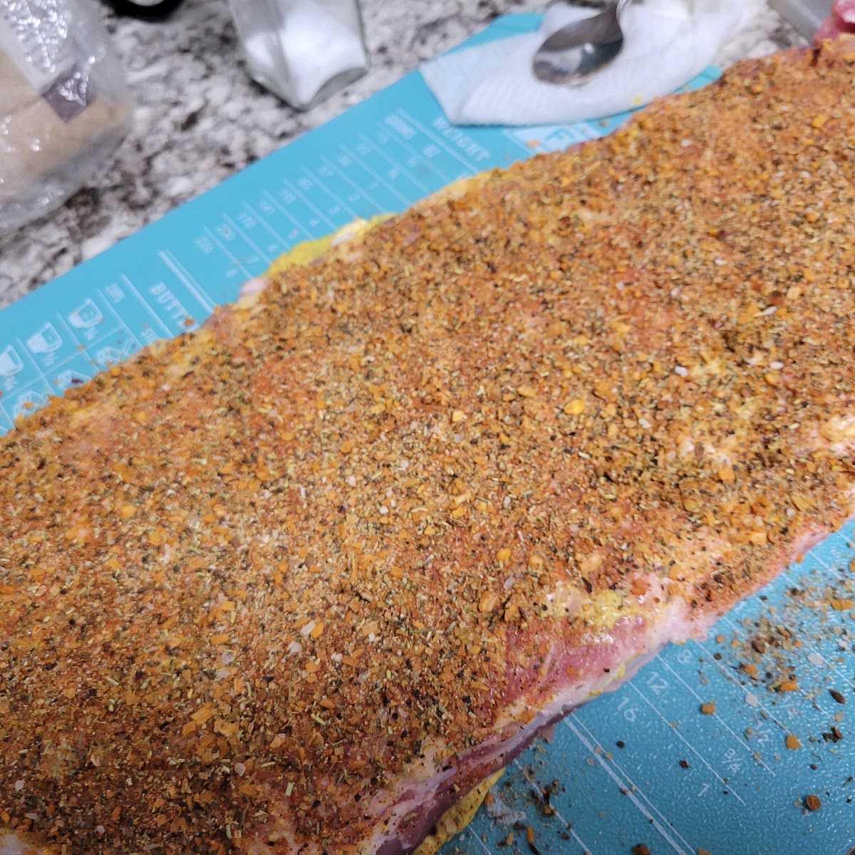 Start seasoning the ribs with the dry mixture made in step one.