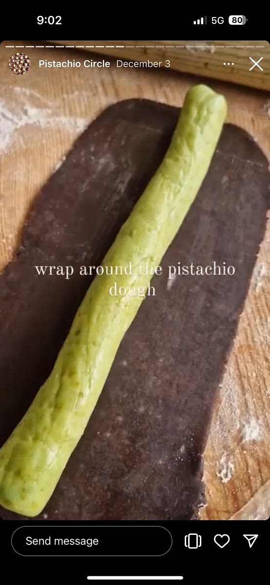 Roll out the cocoa dough into a rectangle. Brush with some water and the wrap around the pistachio dough. Wrap in clingfilm and chill for another 2 hrs min.