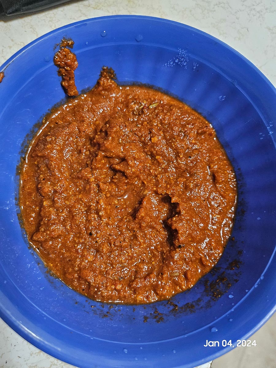 Soak the red dried chilies in hot water for 10 minutes. Once they become soft, add it to a blender with all other ingredients for the masala and blend to a smooth paste.