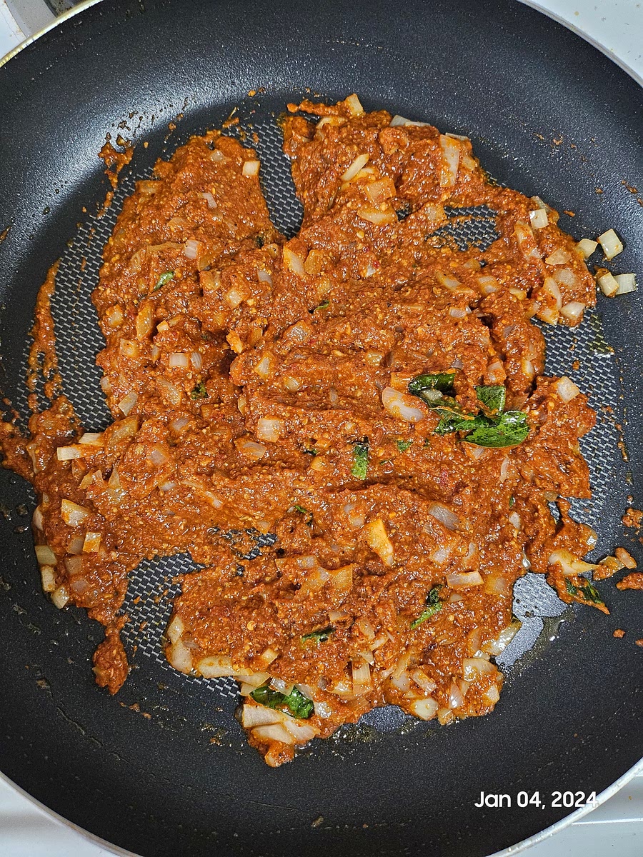 Add in all the remaining masala paste. Cover and cook until all the oil separates.