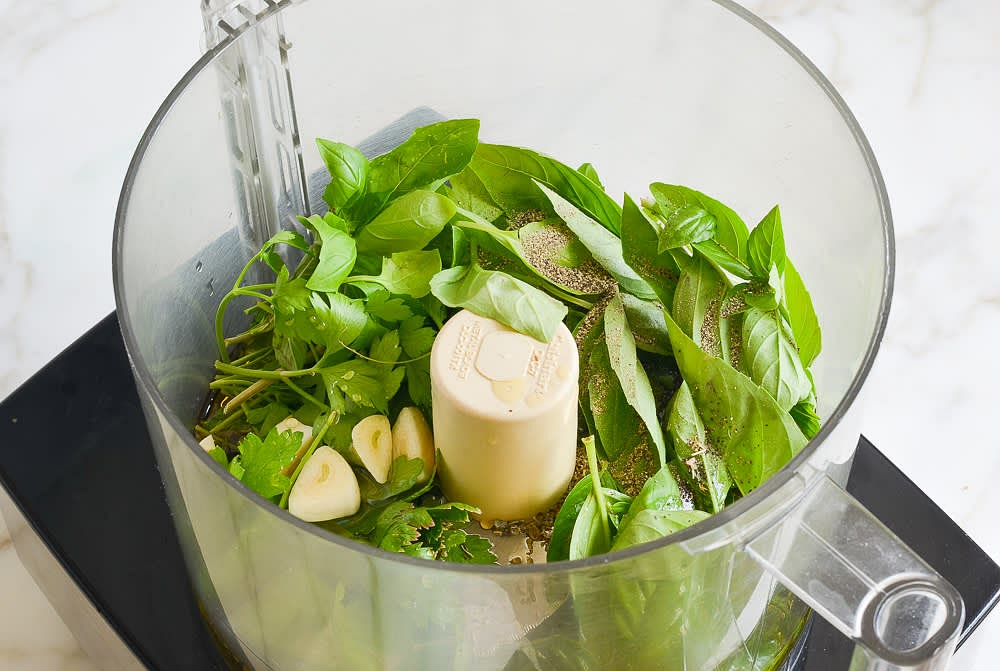Step 1: Make the Homemade Italian Dressing
Combine the parsley, basil, oregano, garlic, red wine vinegar, olive oil, salt, pepper, and honey in the bowl of a food processor; blitz to blend.
