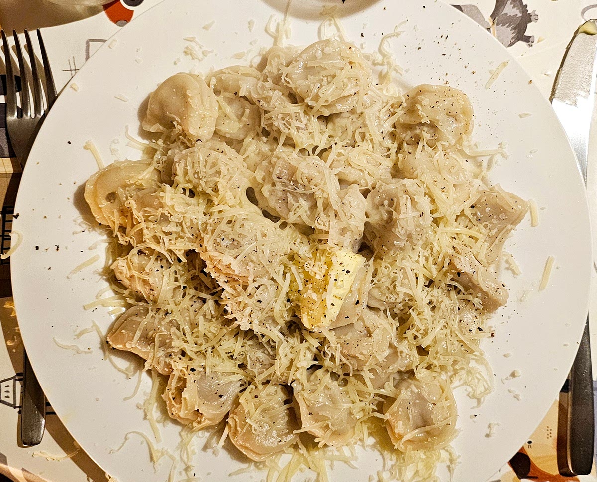Flavour with a small dice of butter, white vinegar, a sprinkle of sea salt, a twist or two of the black pepper mill and a generous grating of cheddar cheese