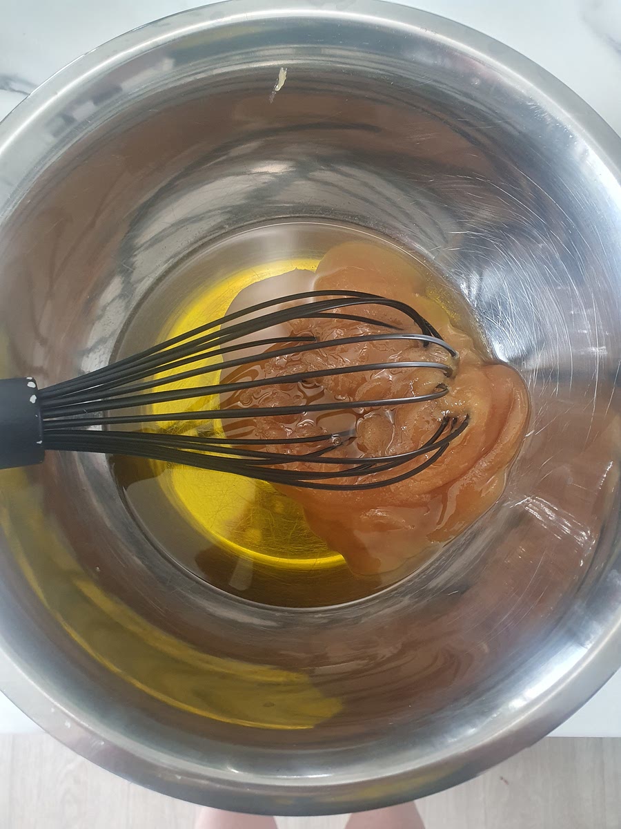 Beat oil and honey together. Add eggs, beat well. Whisk in banana and milk