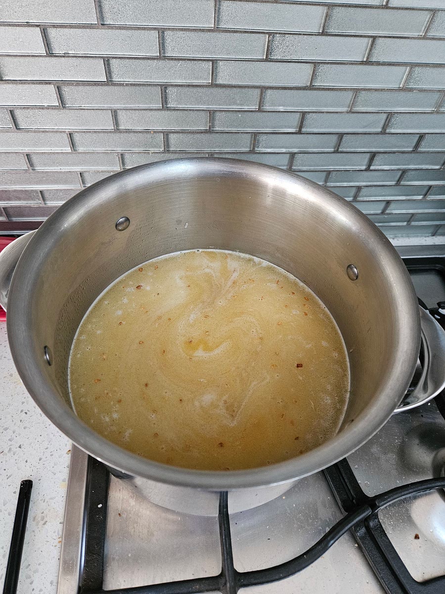 Add basmati rice + 8 cups water. Bring to the boil, then reduce to slow boil, cook covered for 10min stirring occasionally. Then stand covered for 10min.