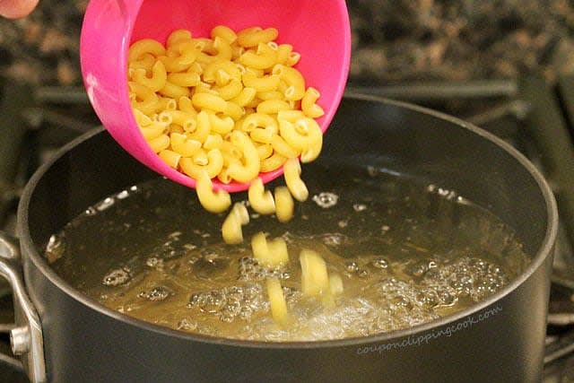 To a large pot of gently simmering water, add 4 heaped tsp of salt and your pasta and let it cook per package instructions. Drain the pasta when it's just about done (still firm) and add it to your sausage sauce.
