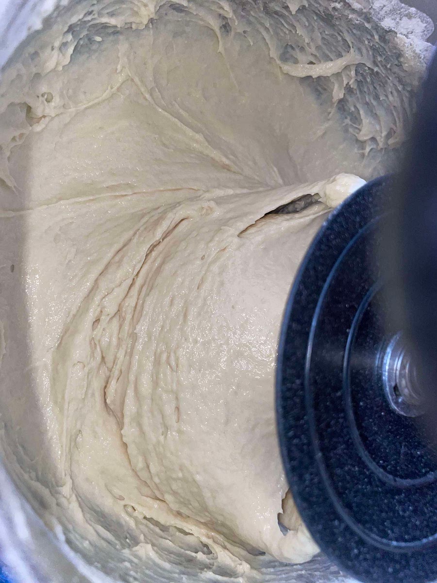 Then add the vegetable oil and salt after that add the flour and mix it until you get a sticky texture you let that rest for at least 20 minutes