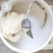 Add another cup of flour and mix to combine. With the mixer running add more flour, ½ cup at a time, until the dough begins to pull away from the sides of the bowl. The dough should be smooth and elastic, and slightly stick to a clean finger, but not be overly sticky. Add a little more flour, if needed.