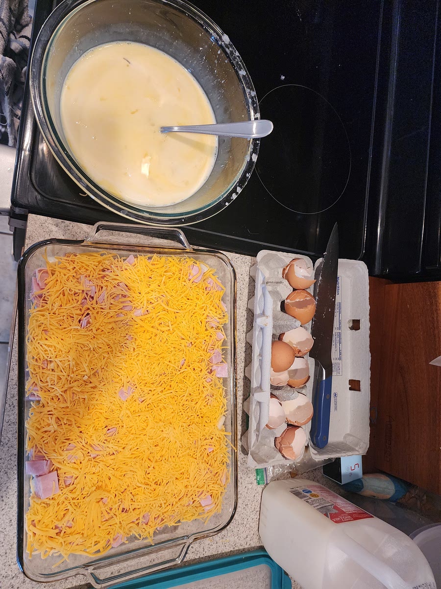 8 to 12 eggs. 1 1/2 Cup Milk. Whip eggs Troughly to BLEND the eggs and pass trough the cheese. and put on top with the MILK