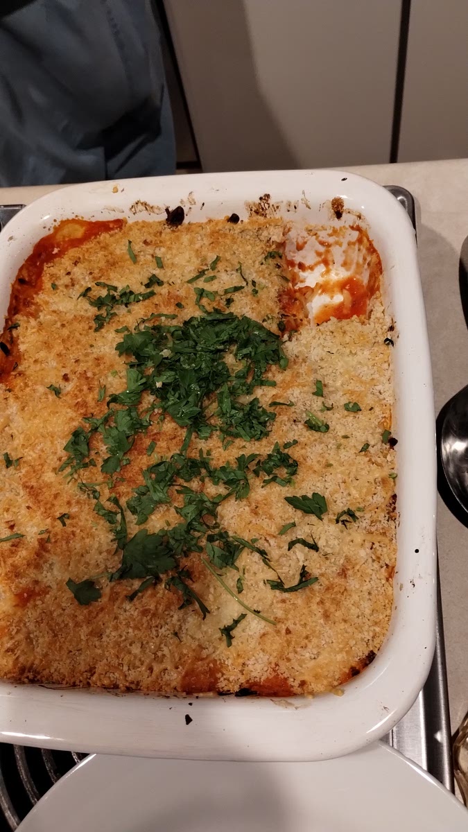 Enjoy the casserole with friends or family.