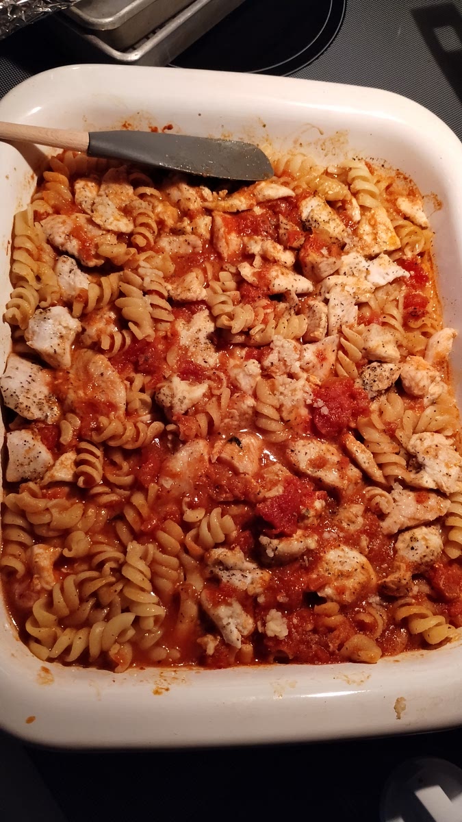 Remove the baking dish from the oven and uncover.