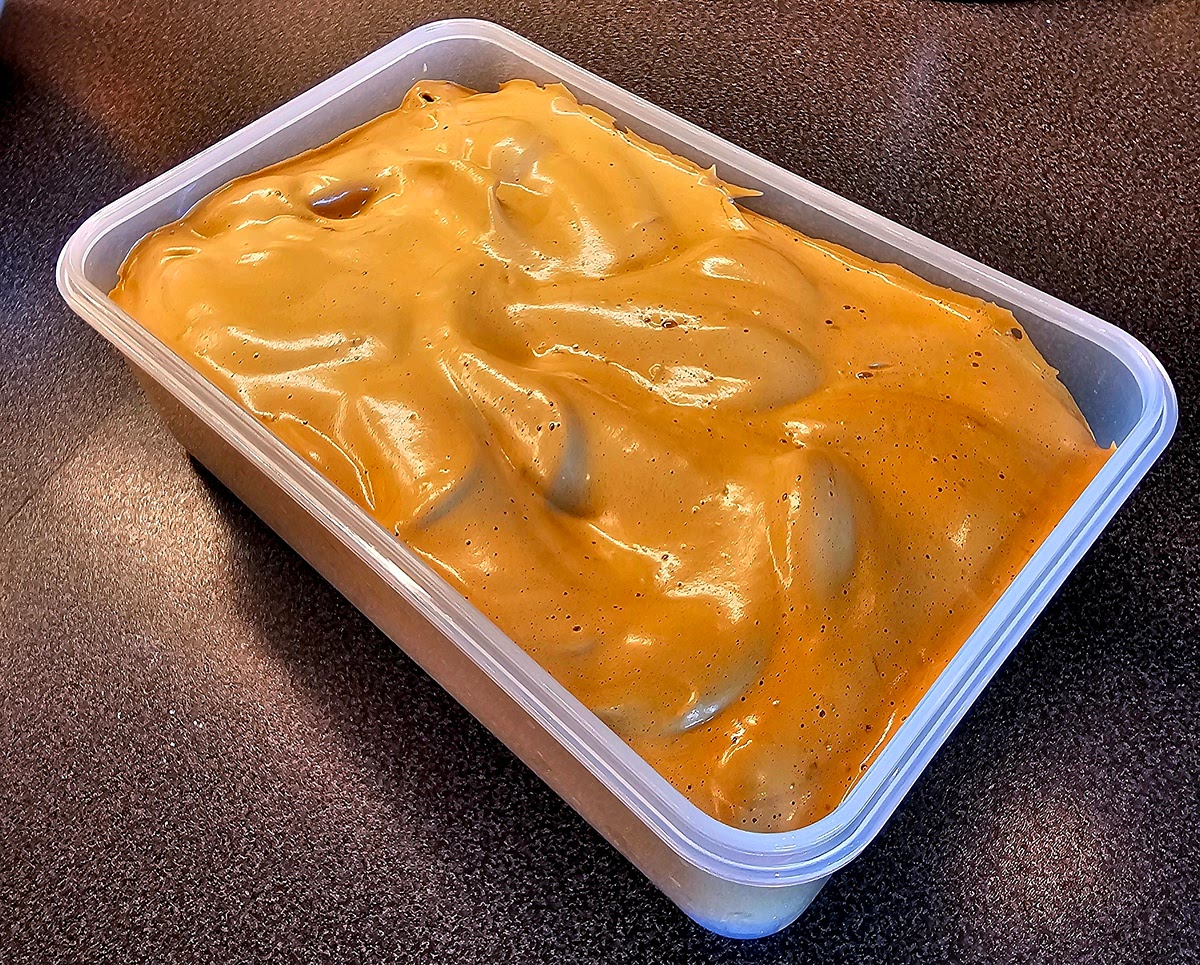 Spread the mixture evenly in a shallow container. Freeze until solid. Before it falls seperates again.