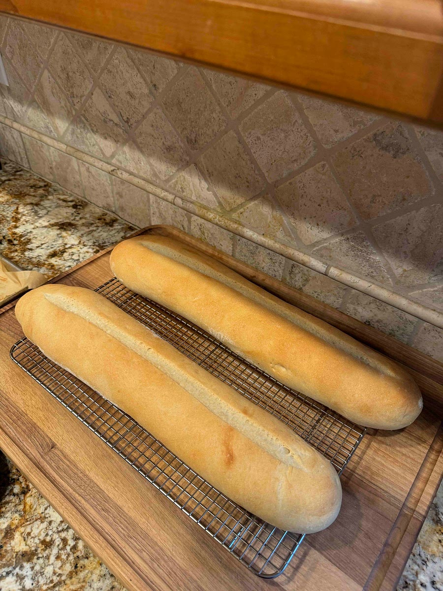 Once bread is cooked to your desired color, remove from oven and place on a cookie rack allowing the bread to cool at least 10 minutes before slicing.