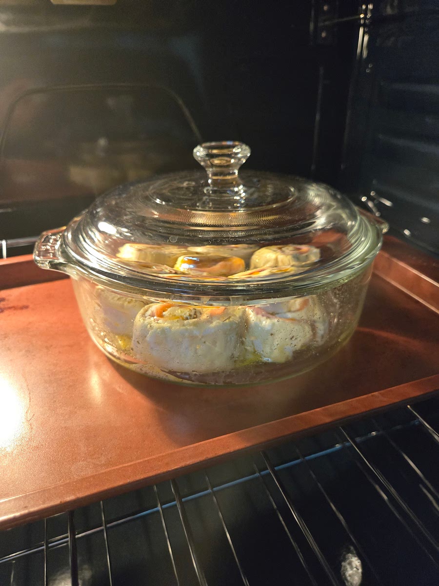 Preheat oven to 350° fahrenheit In a medium sized bowl, Combine flour and yogurt into a basic dough. Turn bowl out onto a lightly floured nonstick surface and knead until the dough has a slightly tacky, elastic texture about 4-6 minutes, and can be formed into a ball. If you poke your dough ball, the indentation should fill itself back in quickly. Roll your dough ball into large rectangle shape, about as thick as the back of a kitchen knife blade. Sprinkle desired spices onto dough. I used ground mustard, Italian seasonings, pepper, and some ranch seasoning. You can use anything you enjoy and have available. On one end of rectangle, lay out turkey and or ham slices, covering at least half of dough rectangle length. Top with cheese slices. Brush with mayo and any other desired spices or herbs. Roll rectangle into a log starting on the end with the toppings, and finishing on the end without. Slice into 8 even circles. Place circles flat sides up and down, in a baking dish that has been sprayed with a nonstick, or wiped with butter. Brush egg over the circles, and add to oven, covered with lid or foil. Pinwheels should cook until firm, with a texture that does not dent with pressure. I uncovered mine at about 25-30 minutes, to allow them to become golden brown for serving. Ensure dough is fully cooked before serving.