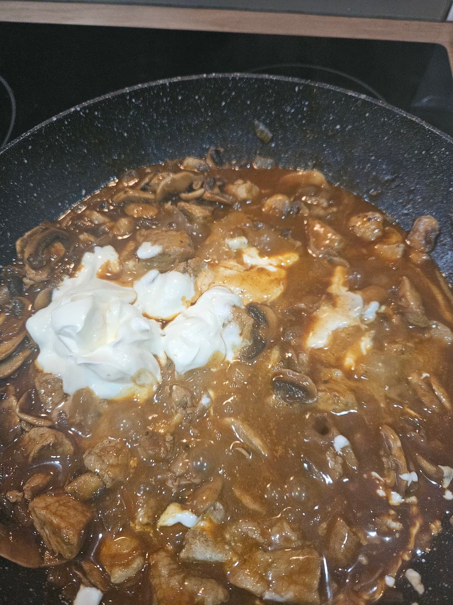 Stir in soured cream to pan and allow to thicken slightly