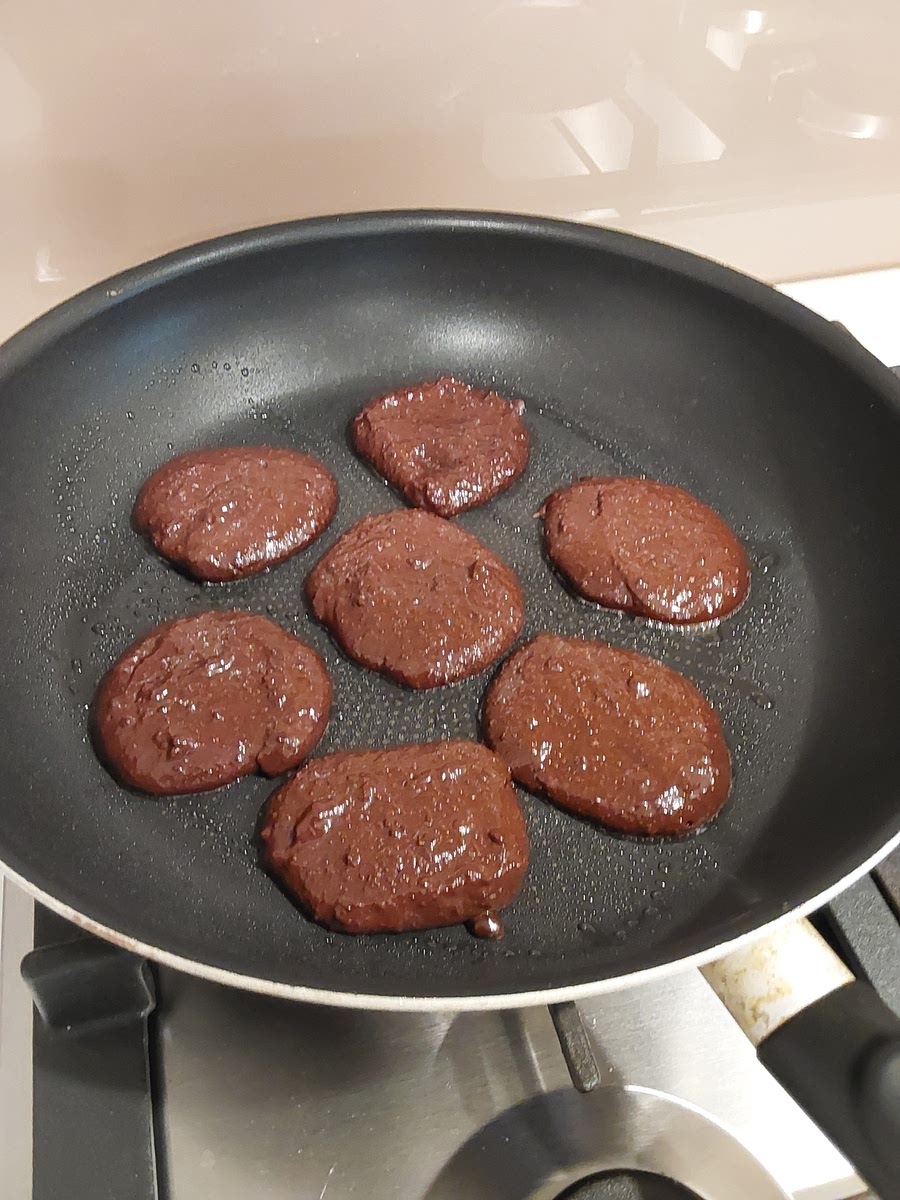 Heat a frypan on medium high heat (gas mark 7) and spray lightly with oil. Spoon batter into the pan to create the pancakes.