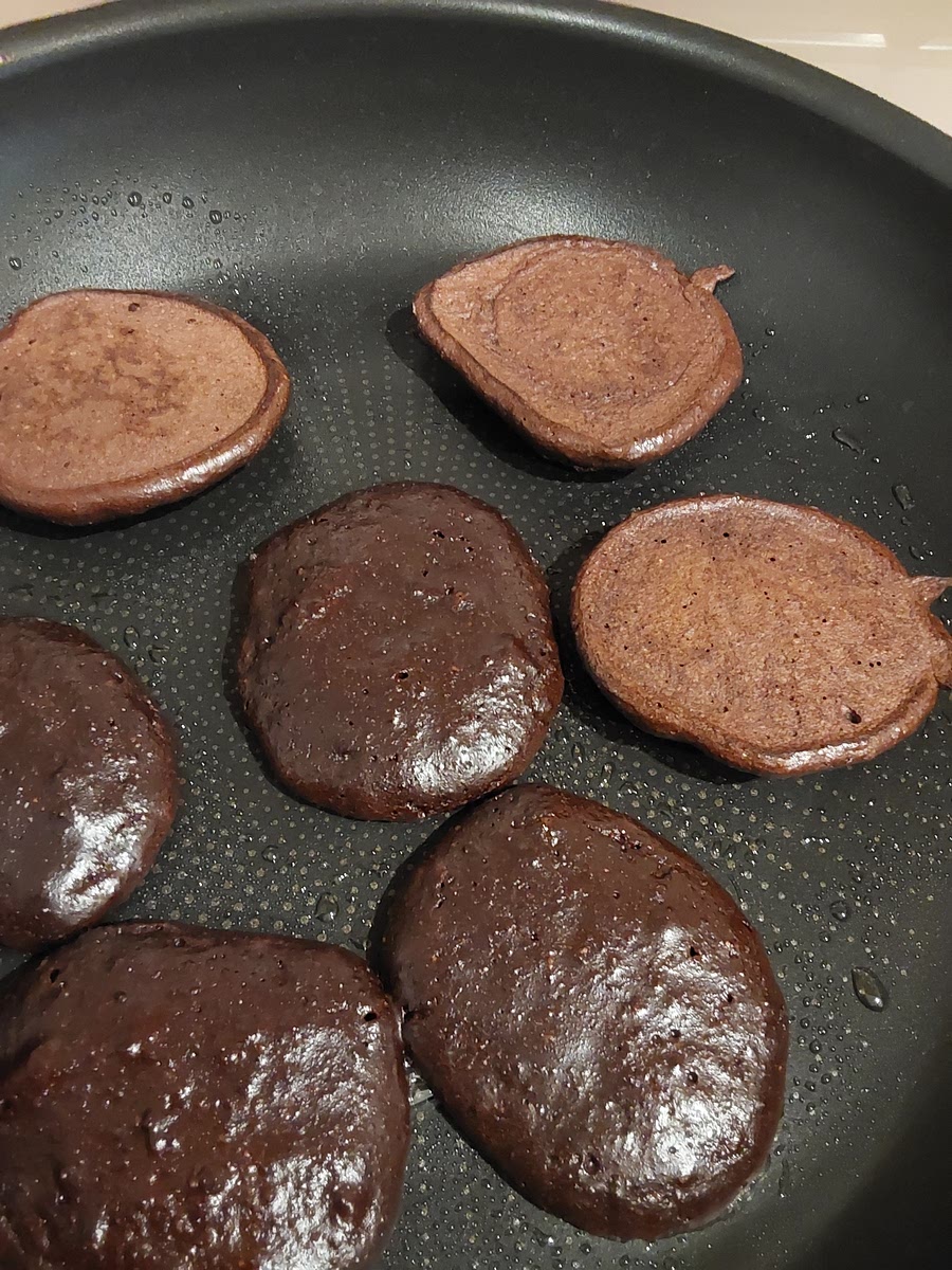 Cook for 2-3 minutes on the first side, until the pancakes are less shiny and firmer. Flip to cook the other side for 2 minutes or so.