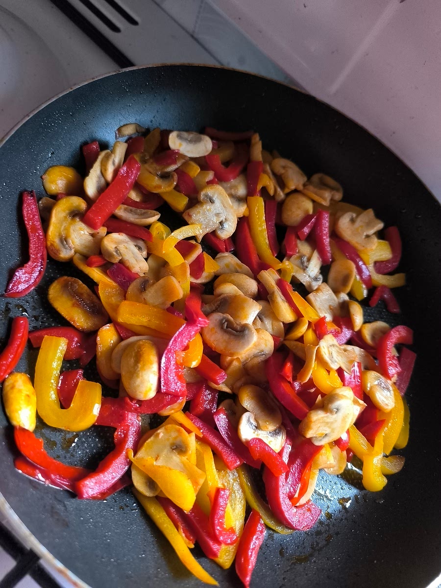 While you boil chicken, cut paprika and shrooms and put them in pan and fried them 5min...
