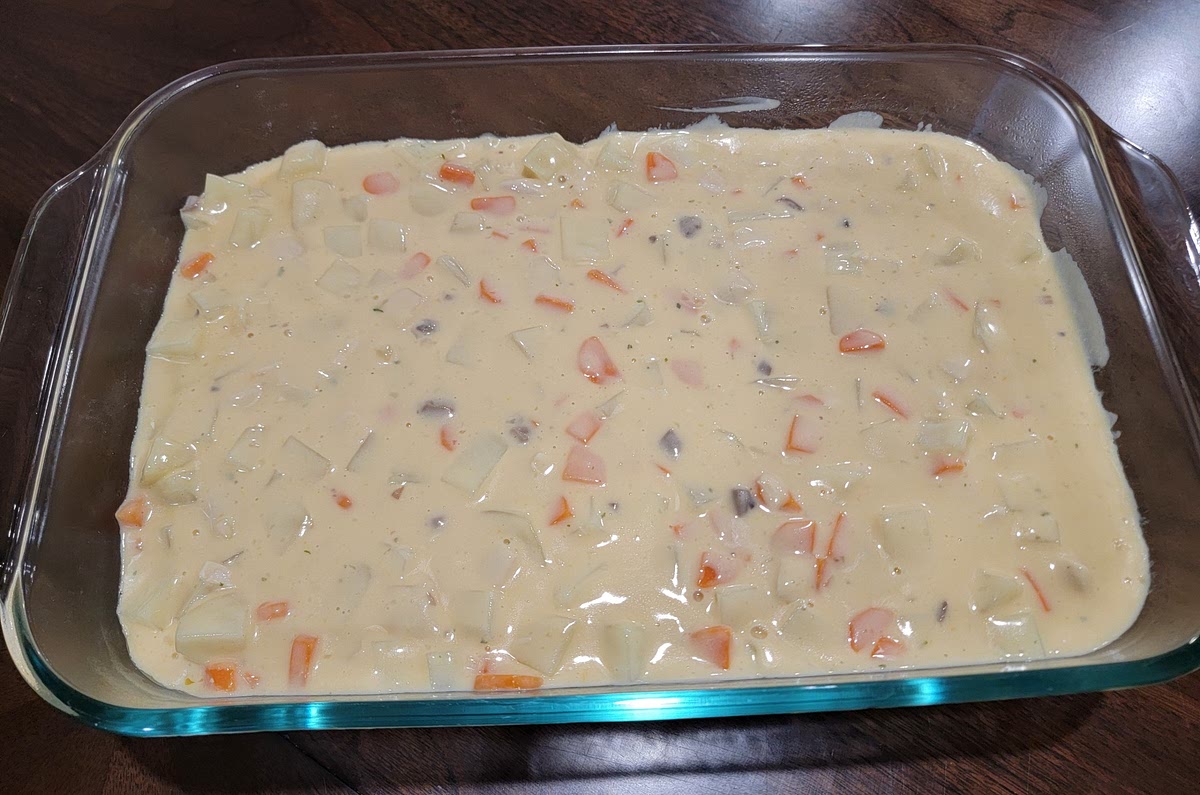 6. Add crushed French fried onions to top of casserole, making sure to generously coat everything, from edge to edge.